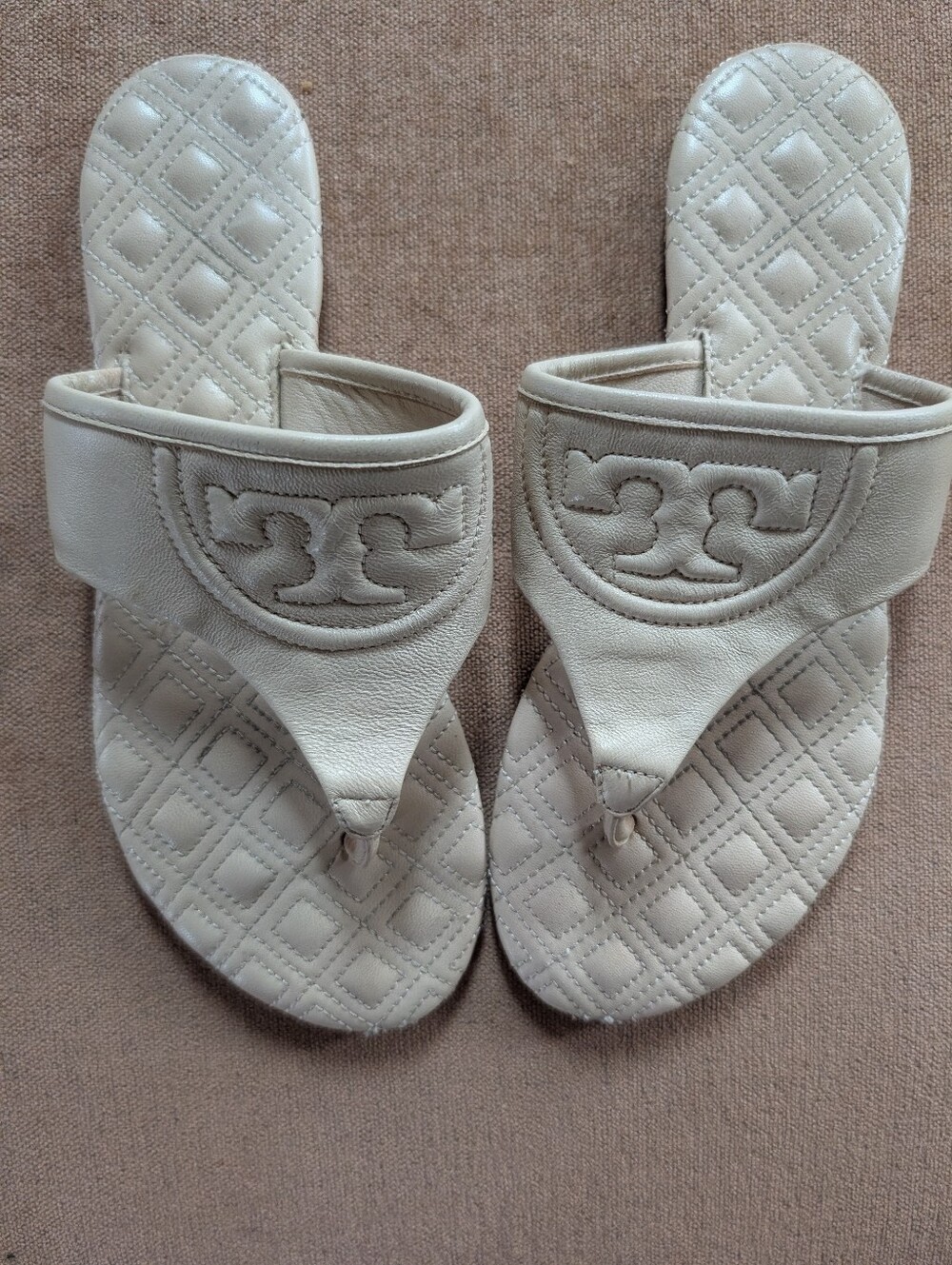Tory Burch Fleming Quilted Leather Thong Sandals in Tan.